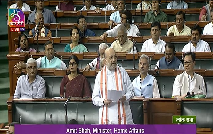 Home Minister in LS introducing bills